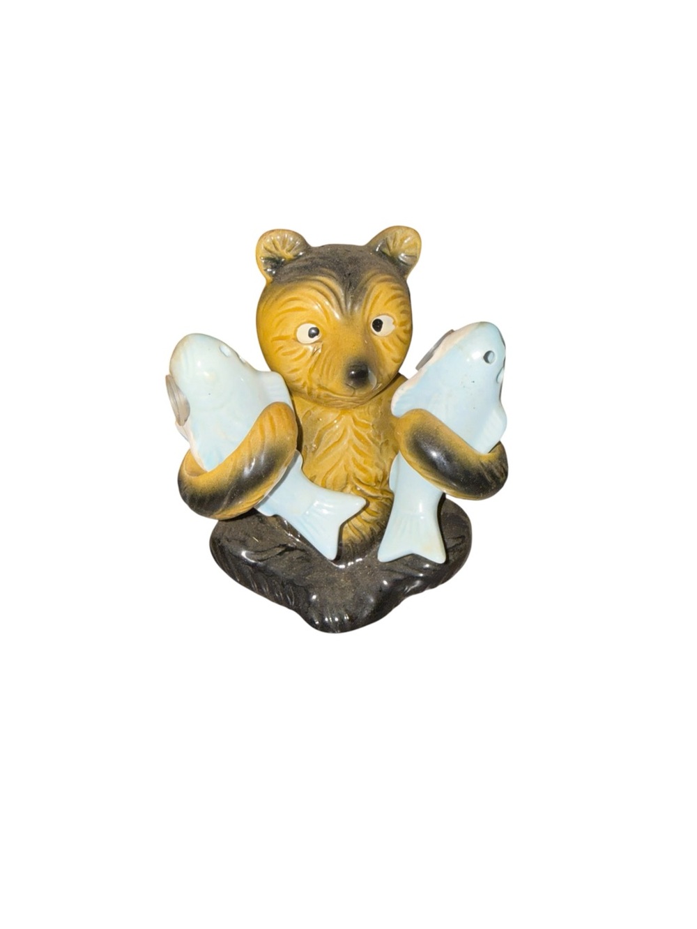 Vintage brown black bear holding blue fish salt and pepper